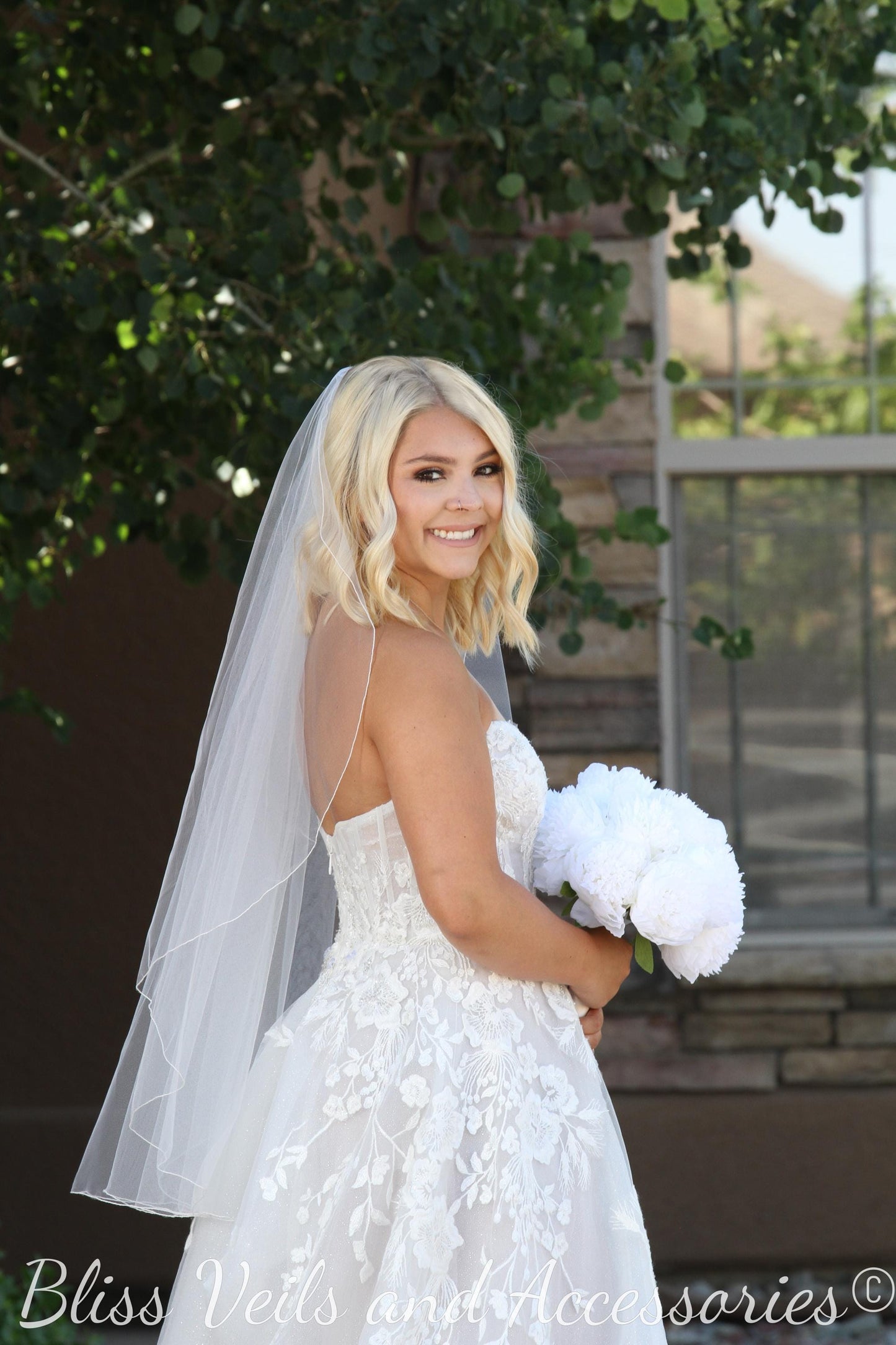 One tier angel cut wedding veil with pencil edge