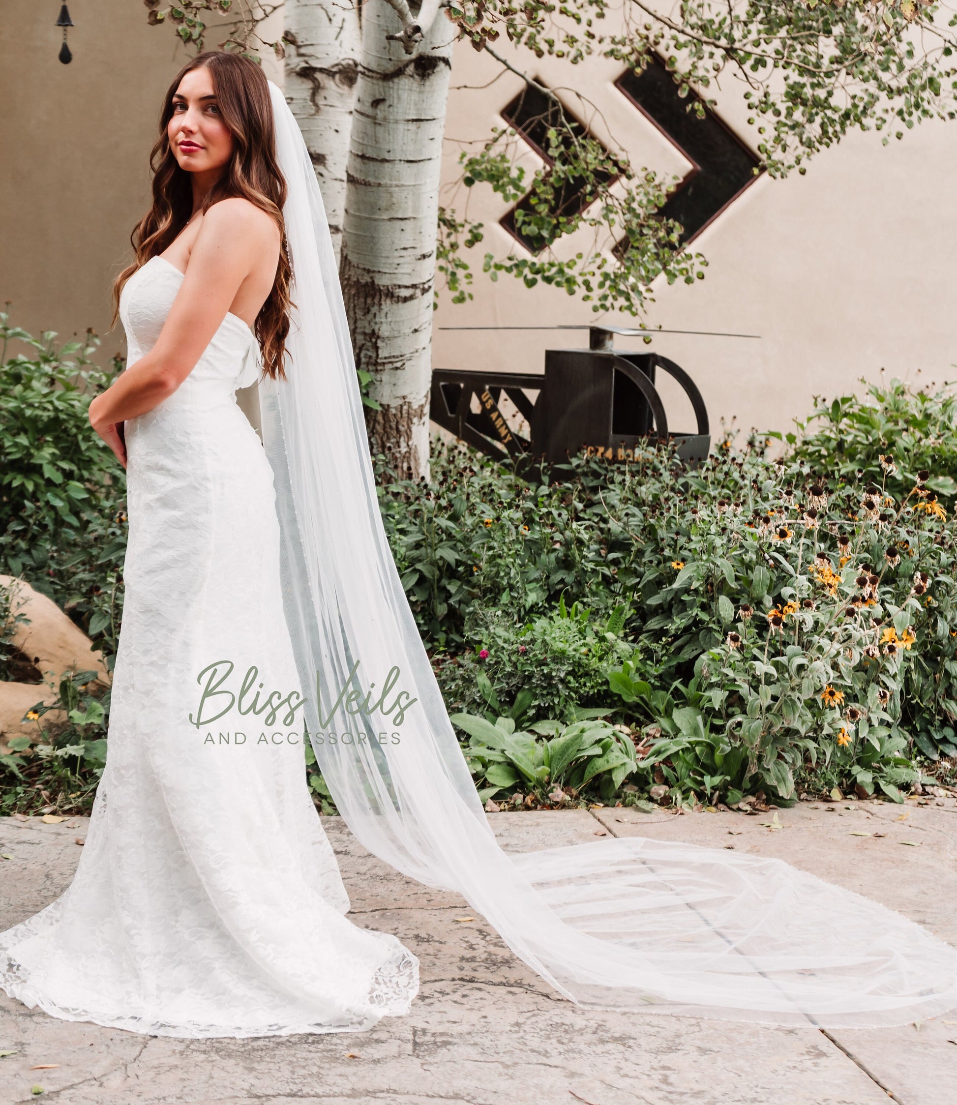 Crystal beaded one tier wedding veil made with soft tulle