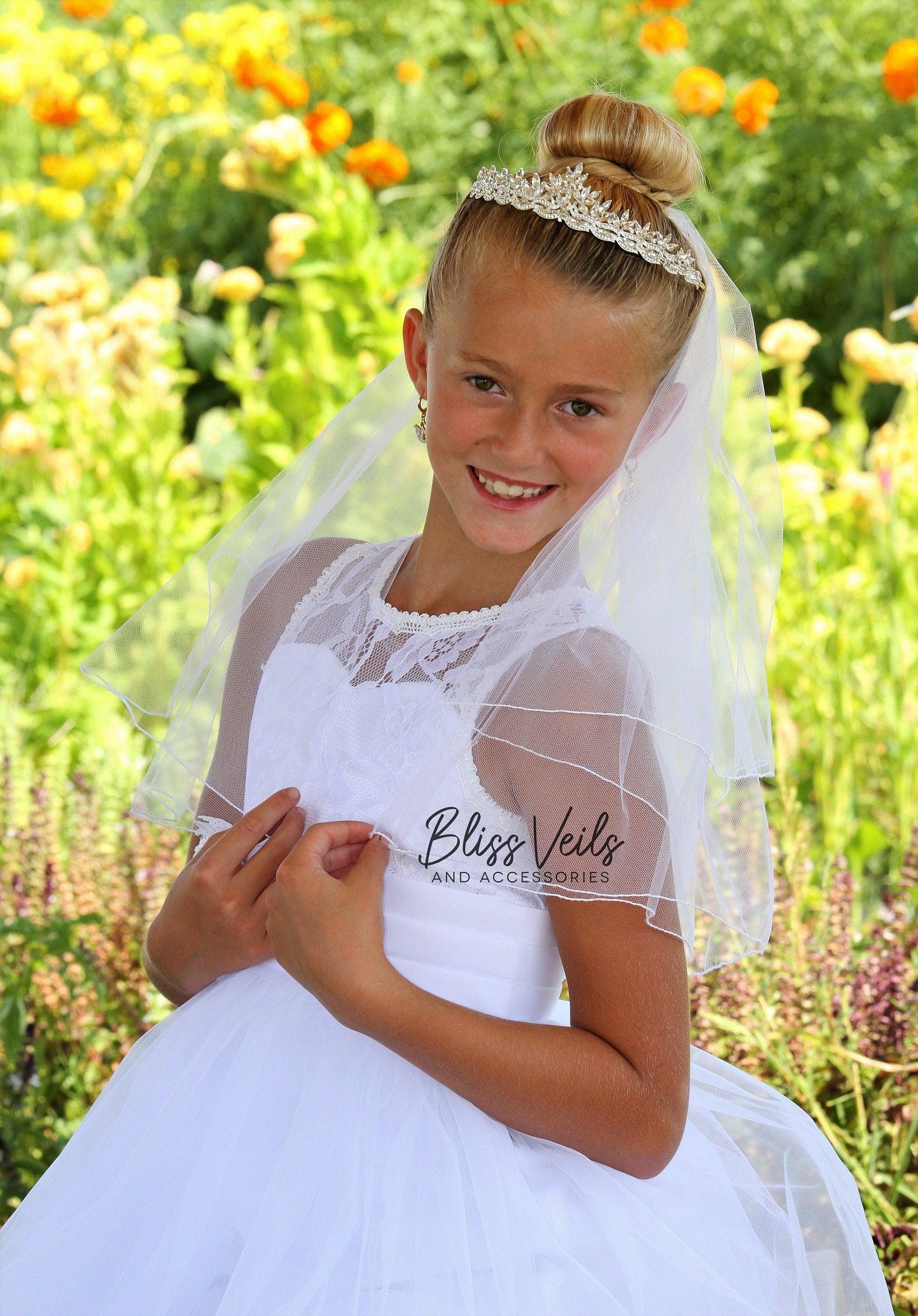 Two layer pencil edge First Communion veil with separate crystal tiara, available in bright white, soft white, and light ivory, available in 2 lengths.