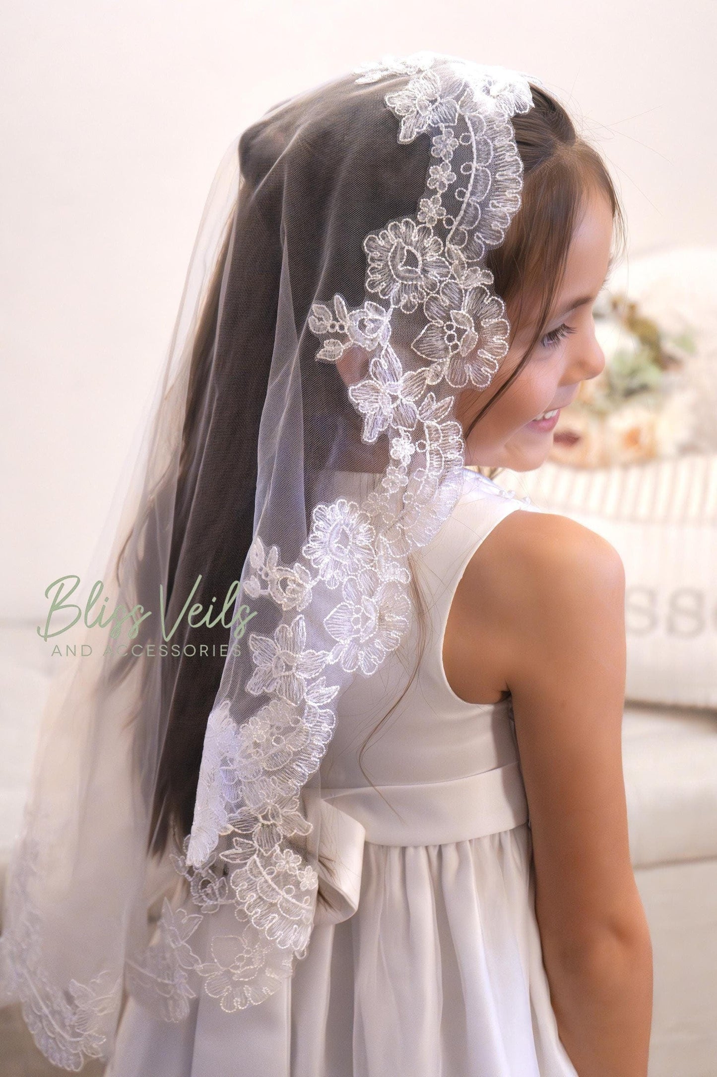Wide lace First Communion mantilla veil for girls with Chantilly lace edge available in pure white or soft white for a traditional, elegant look.