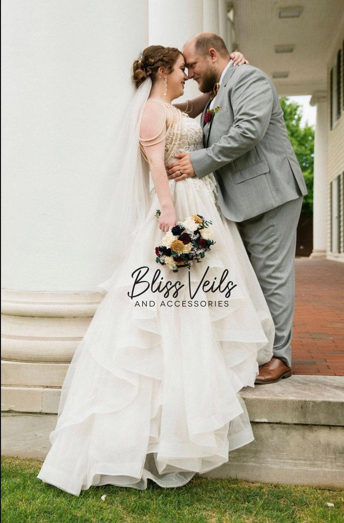 Two layer wedding veil with blusher and raw cut edge in ivory tulle