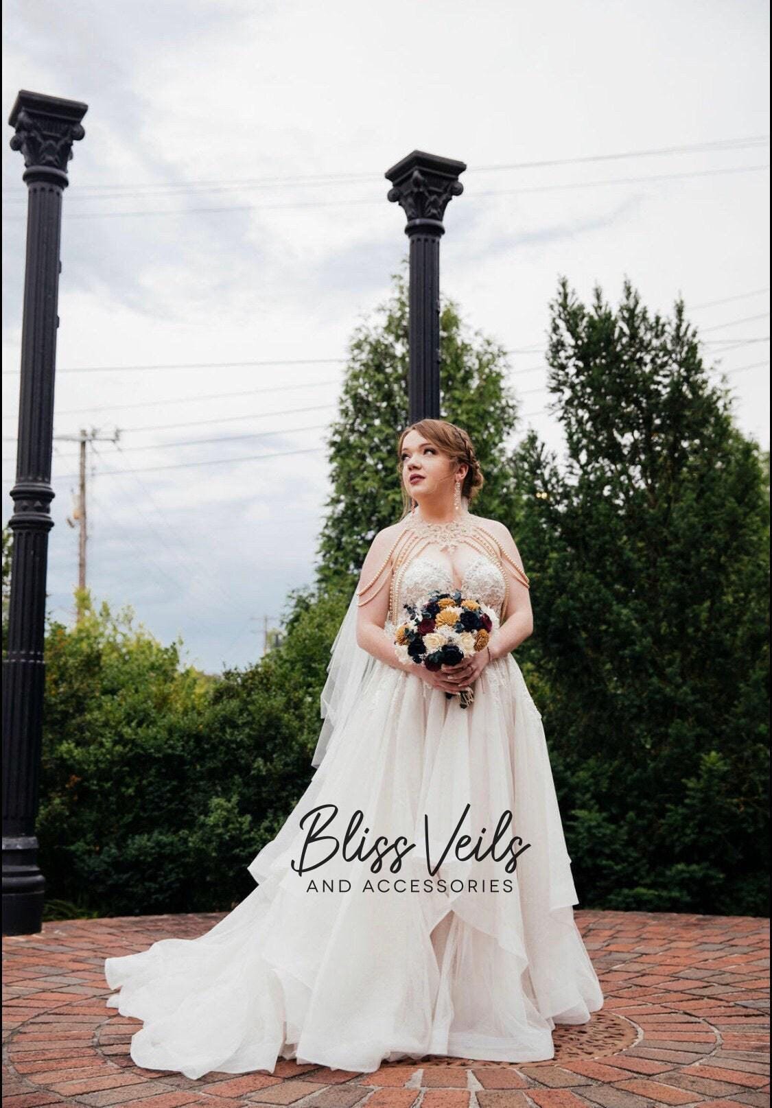 Soft tulle bridal veil with fingertip length blusher layer