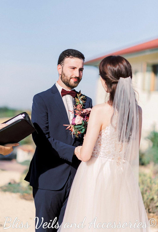 Lightweight one tier wedding veil with cut edge in soft white or light ivory