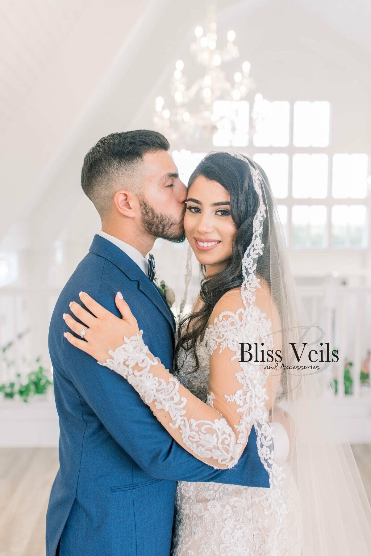 Lace mantilla wedding veil shown in cathedral length