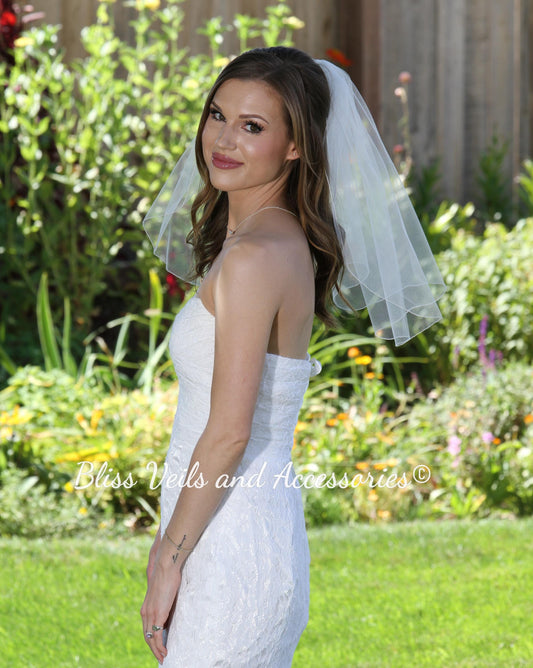 Short one tier bridal veil with pencil edge in soft white