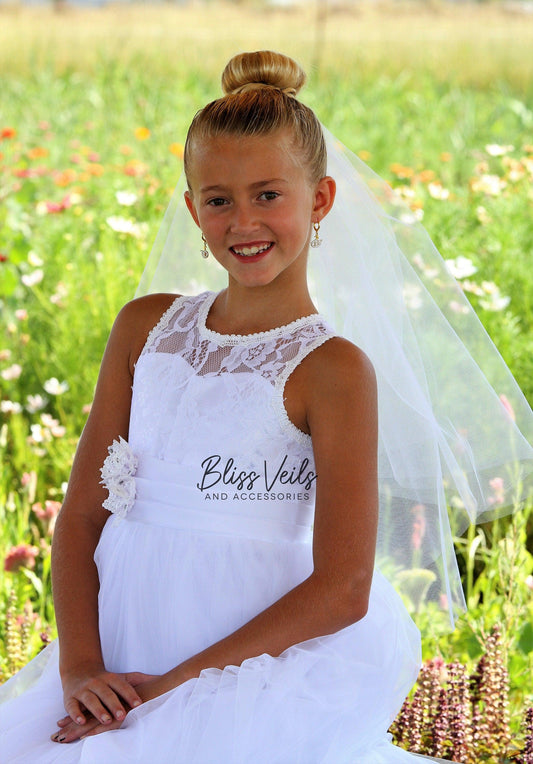 Two-layer First Communion veil with raw edge in soft tulle, available in bright white, soft white, and light ivory