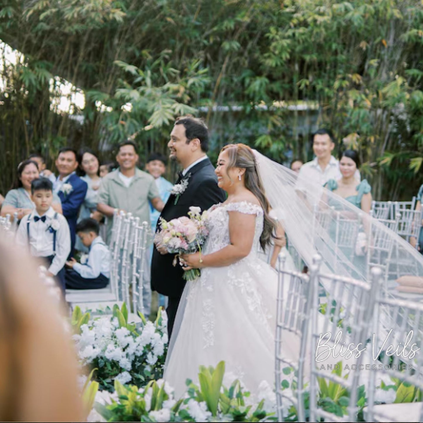 Minimal sheer wedding veil with cut edge and one tier design