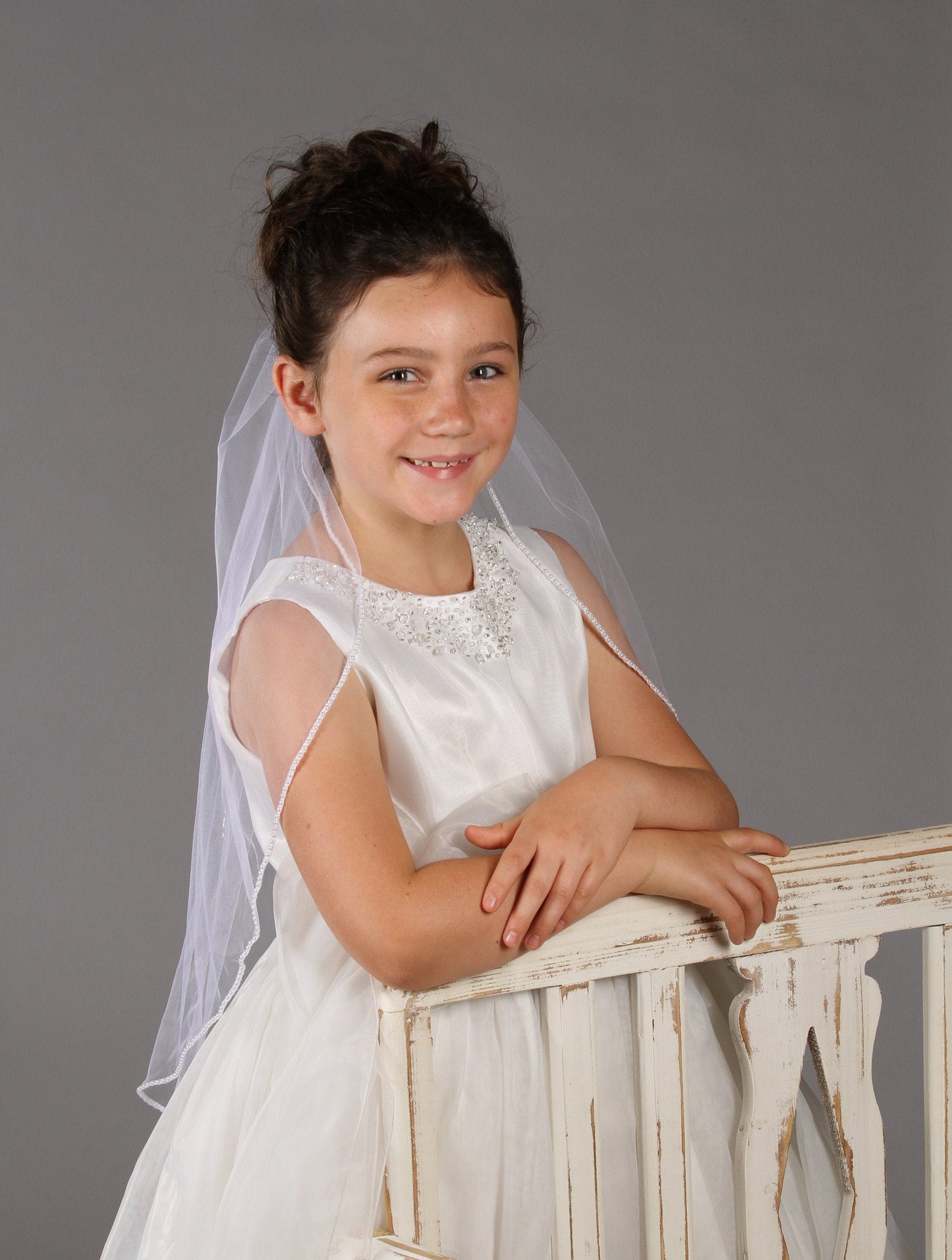 Holy Communion veil featuring pearl trim and single layer tulle